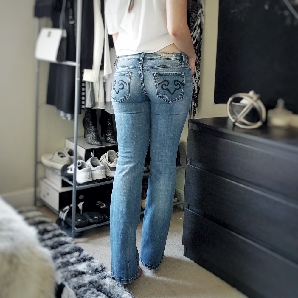 Medium wash low rise bootcut jeans